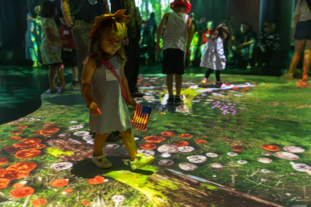 1. Families experience art, storytelling, and imagination in Colors of Creation at The Weitzman Museum